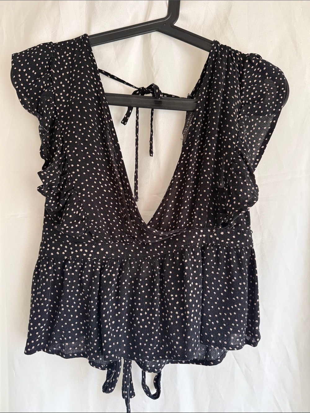 Dress Forum Black Polka Dot Ruffle V-Neck Top
